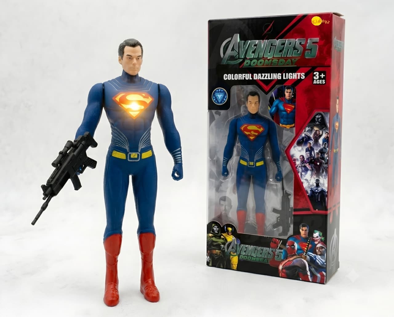 KIDOYZ Superman Action Figure 18cm / 7 Inch | Light-Up Glowing Chest & Weapon Blaster Accessory | Articulated Poseable Superhero Toy for Kids Ages 3+