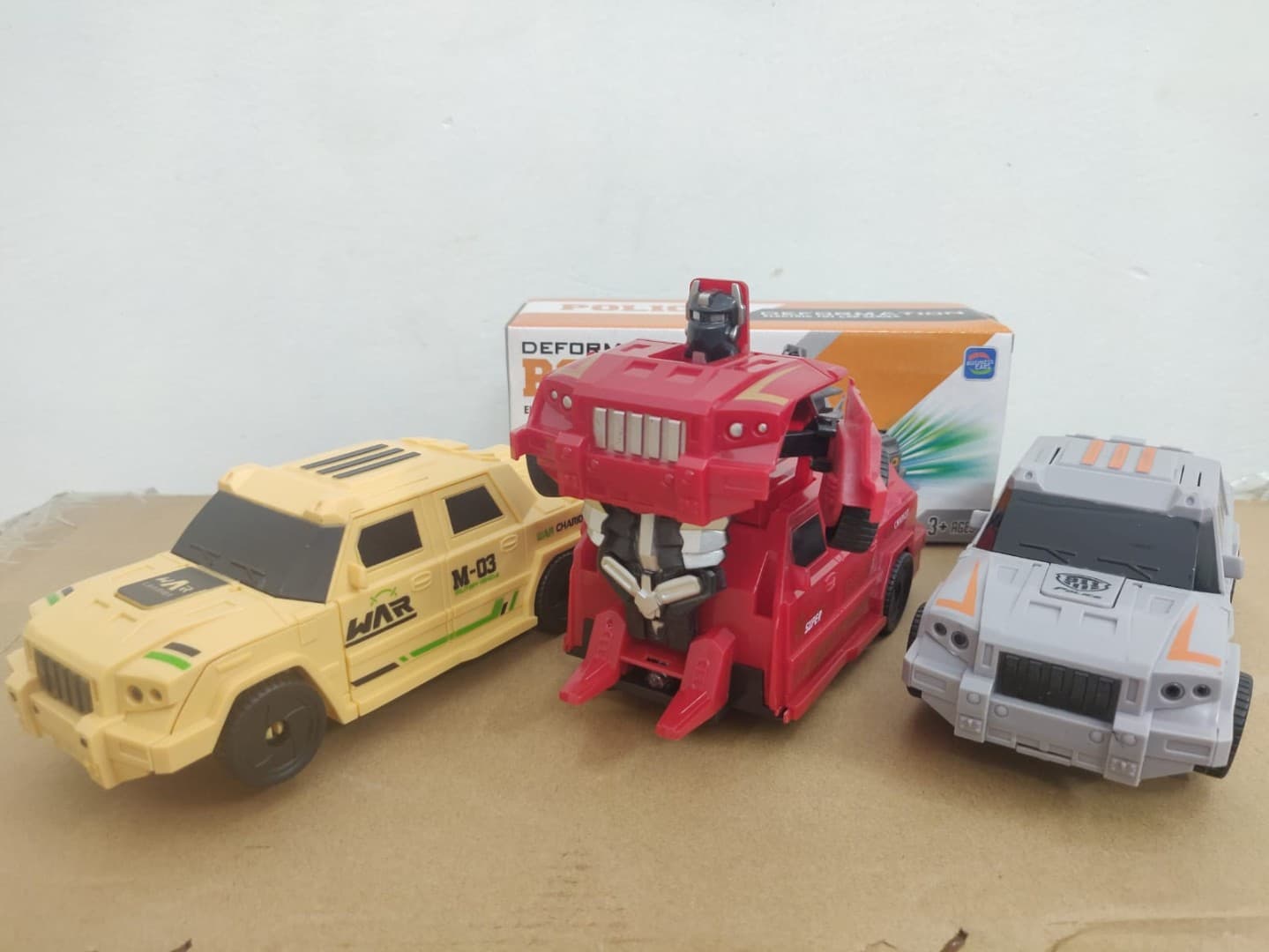 Kidoyz Transforming Pickup Truck Robot Toy | Deformation Car with Light Trails | Police, Military & Red Designs | Color As Per Stock — view 2